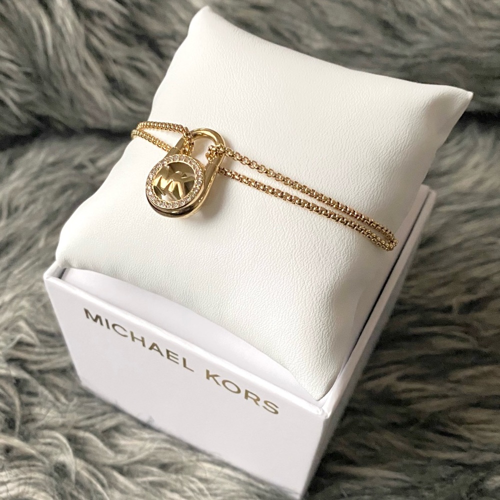 NWT authentic MK gold plated logo padlock adjustable bracelet